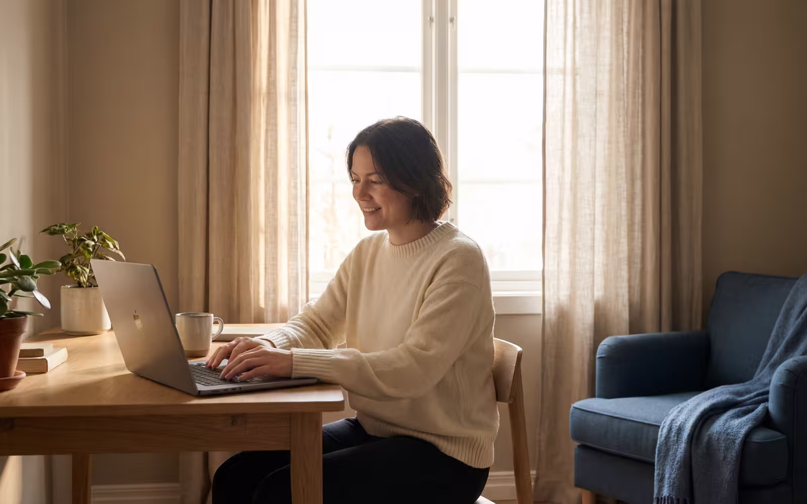 Hands on a laptop with a clean app dashboard — the architecture in action.